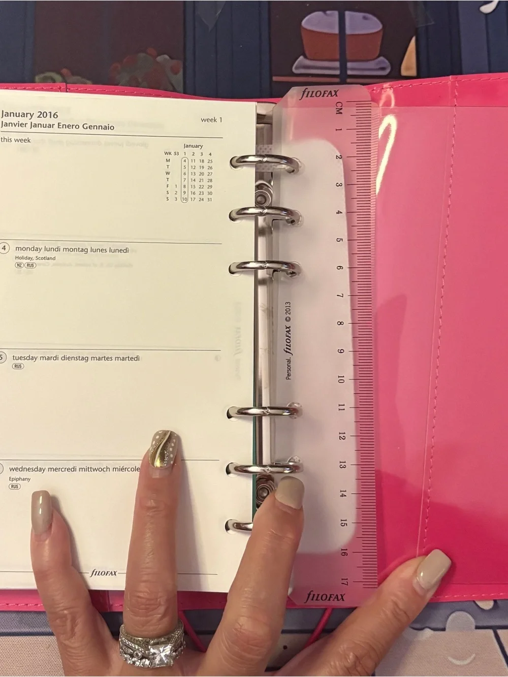 Filofax domino in pink, patent leather, personal size.